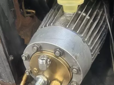 Full refurbishment carried out on the C3 pump assembly during servicing work on a heavily used Nilfisk Neptune 7. The pump was stripped down, inspected for wear, rebuilt with new valves and seals, and refilled with fresh oil ready for continued heavy-duty